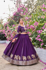 Luxurious deep purple Pure Fendy lehenga folded neatly, showcasing heavy embroidery and sequins work.