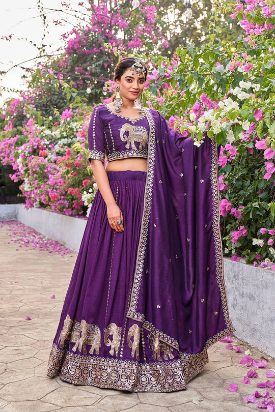 Deep purple Pure Fendy lehenga with sequins embroidery and moti work displayed on mannequin.