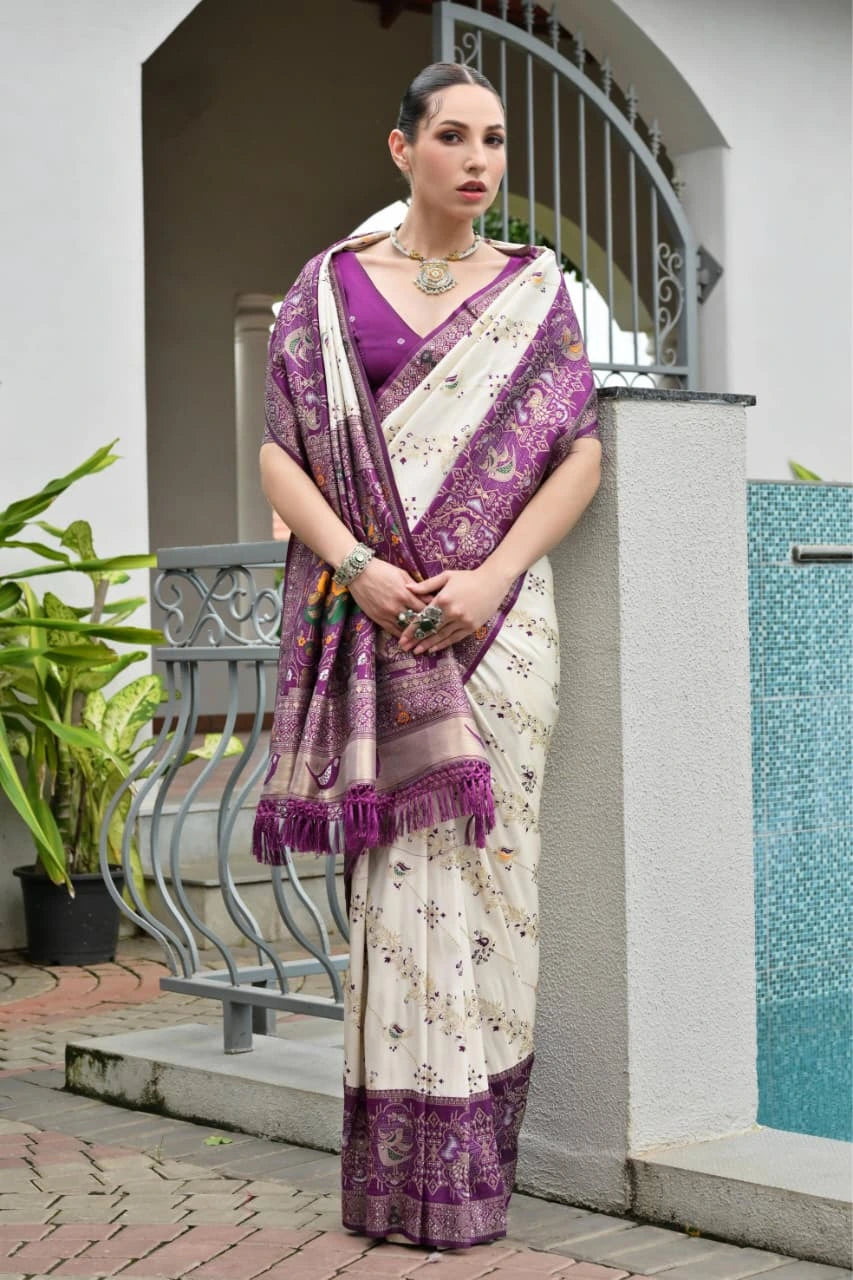 Deep purple Banarasi silk saree with shimmering golden zari weaving displayed on mannequin