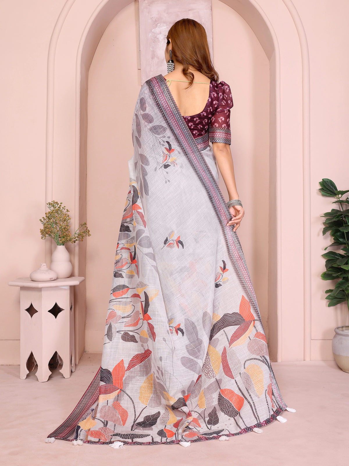 Gray Digital Floral Print Saree back view – printed pallu with dense botanical motifs and white tassel hem