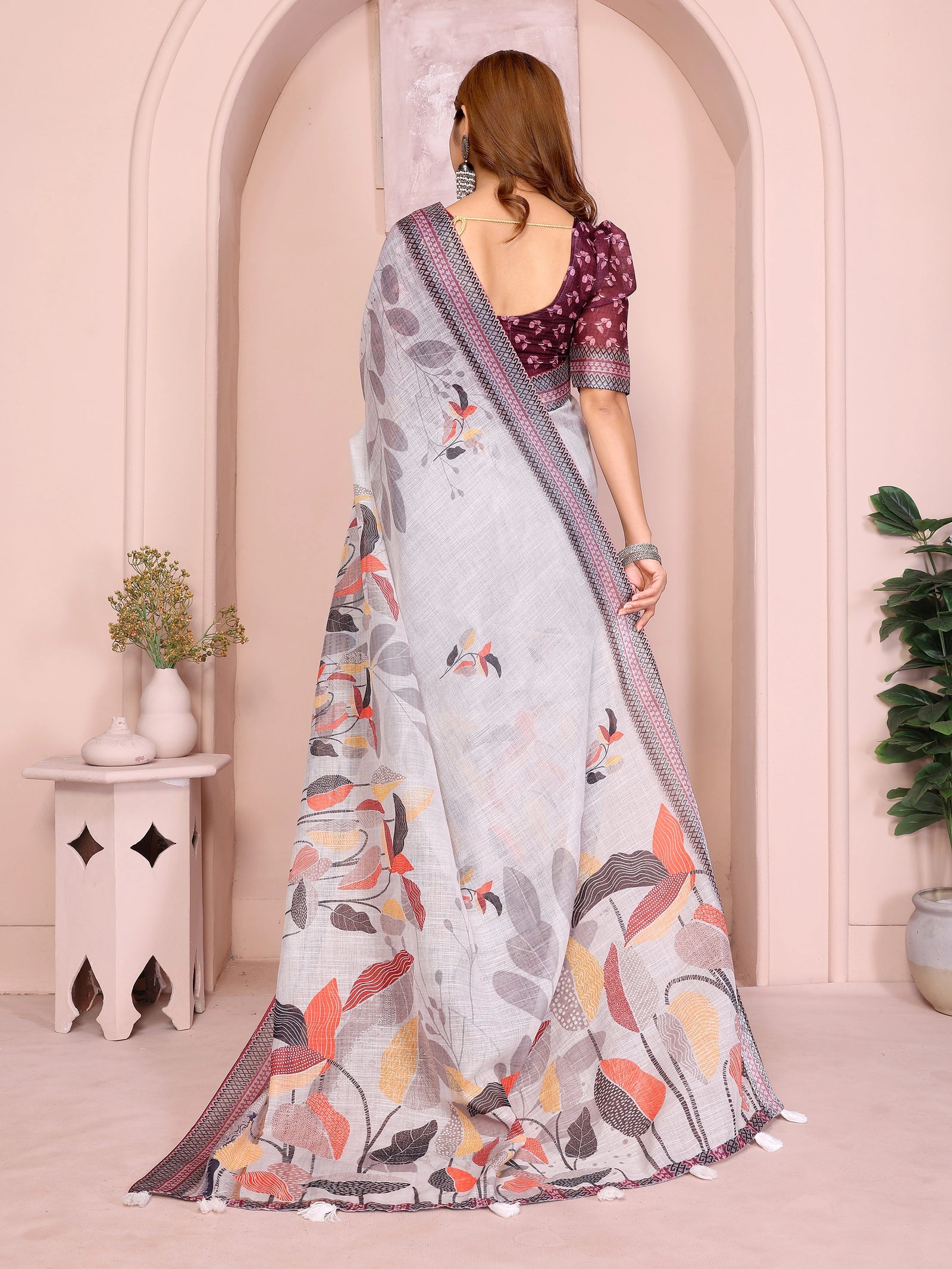 Gray Digital Floral Print Saree back view – printed pallu with dense botanical motifs and white tassel hem