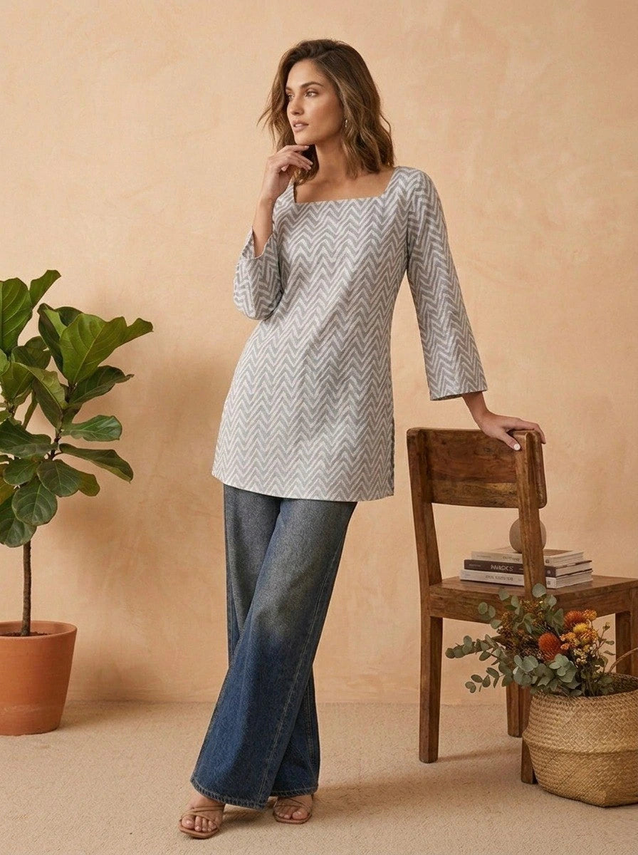 Modern short kurti in gray featuring vibrant printed flowers