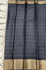 Graceful Indian saree showcasing luxurious texture and classic woven patterns.