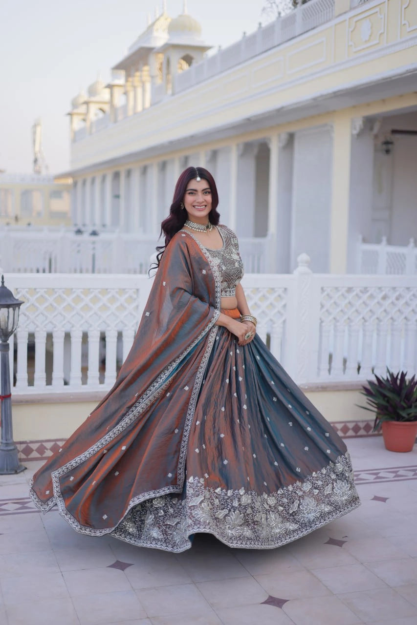 Woman in traditional outfit with a white building and decorative elements in the background