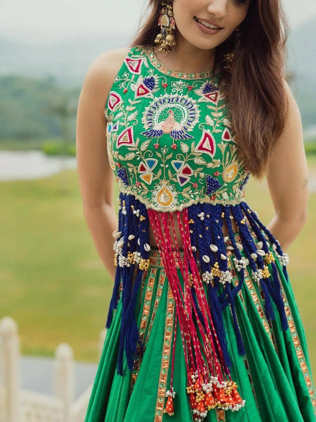 Green Digital Print Lehenga close-up of peacock embroidered choli and dori tie-up waistband