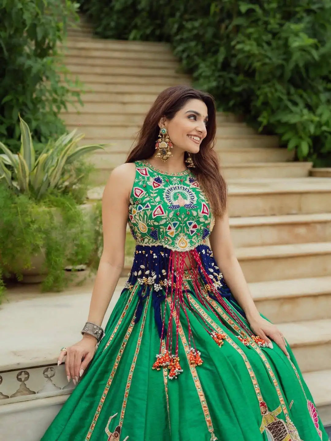 Green Digital Print Lehenga side view highlighting choli embroidery and bangles