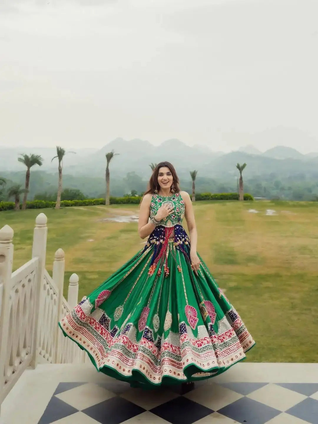 Green Digital Print Lehenga twirl view with Rajasthani dance motif skirt