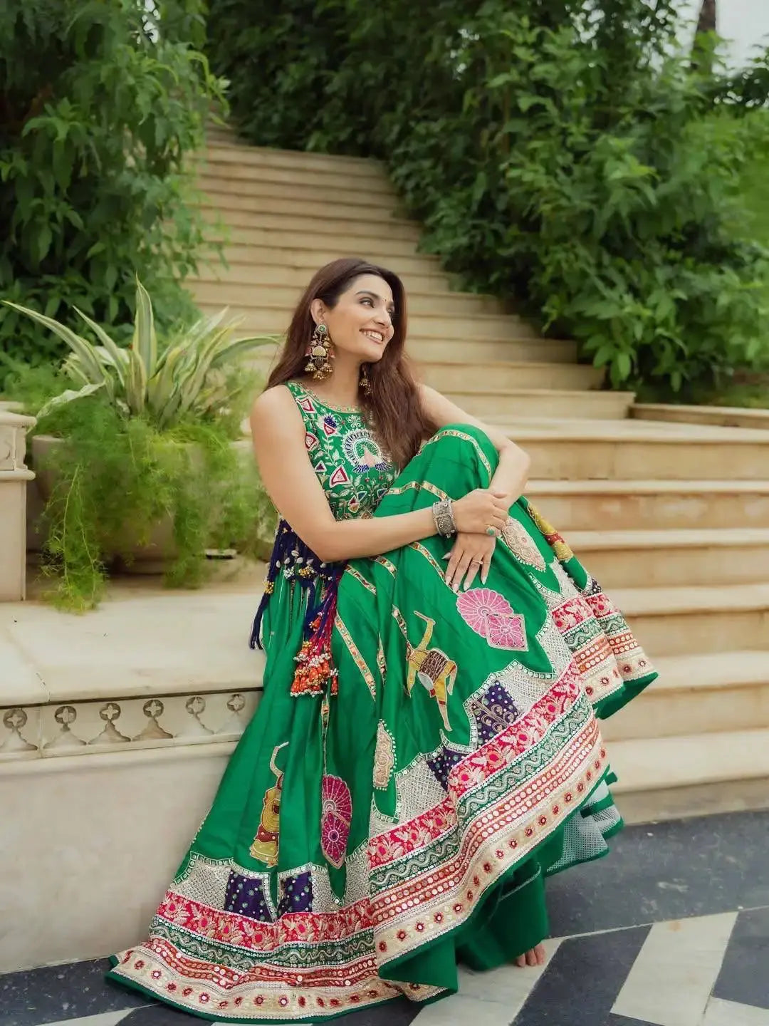 Green Digital Print Lehenga seated view showing choli and waistband detail