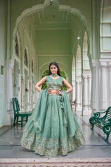 Full length front view of green gold crush lehenga with multicolor Mughal border and dupatta