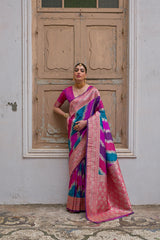 Pink saree with Kadwa style weaving and multicolor stripes