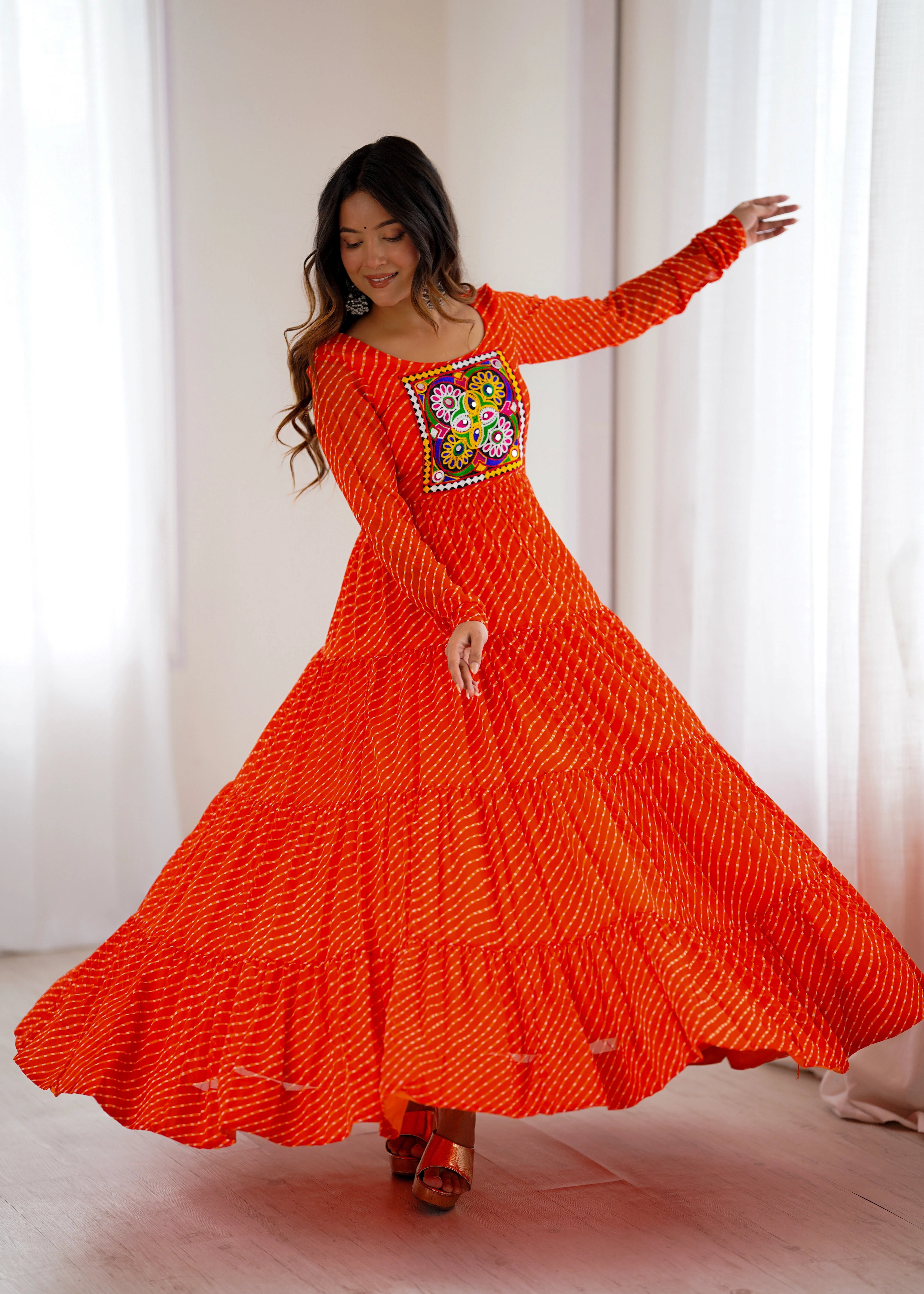 Orange Gamthi with Laheriya Print Fox Georgette Gown