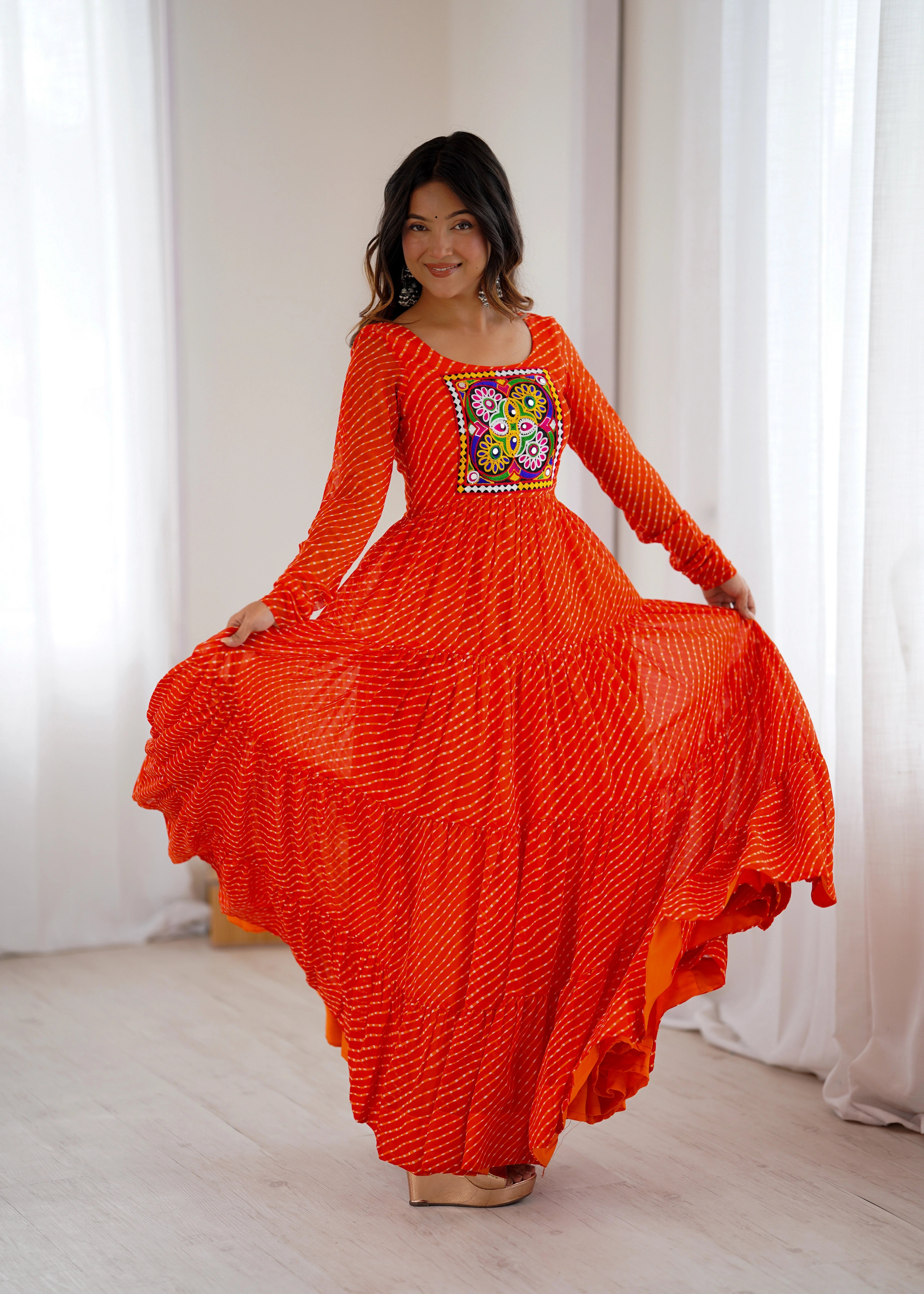 Orange Gamthi with Laheriya Print Fox Georgette Gown