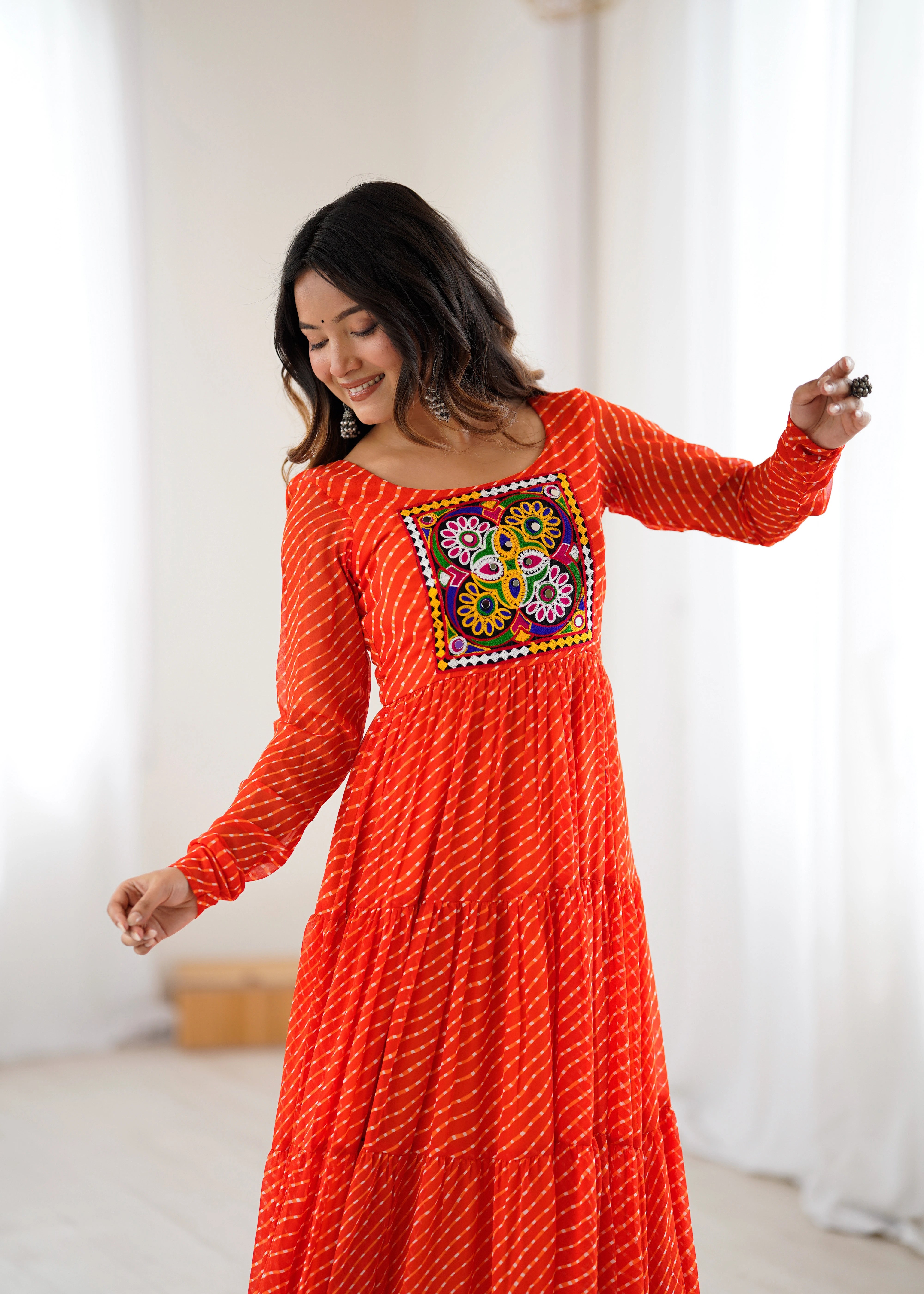 Orange Gamthi with Laheriya Print Fox Georgette Gown