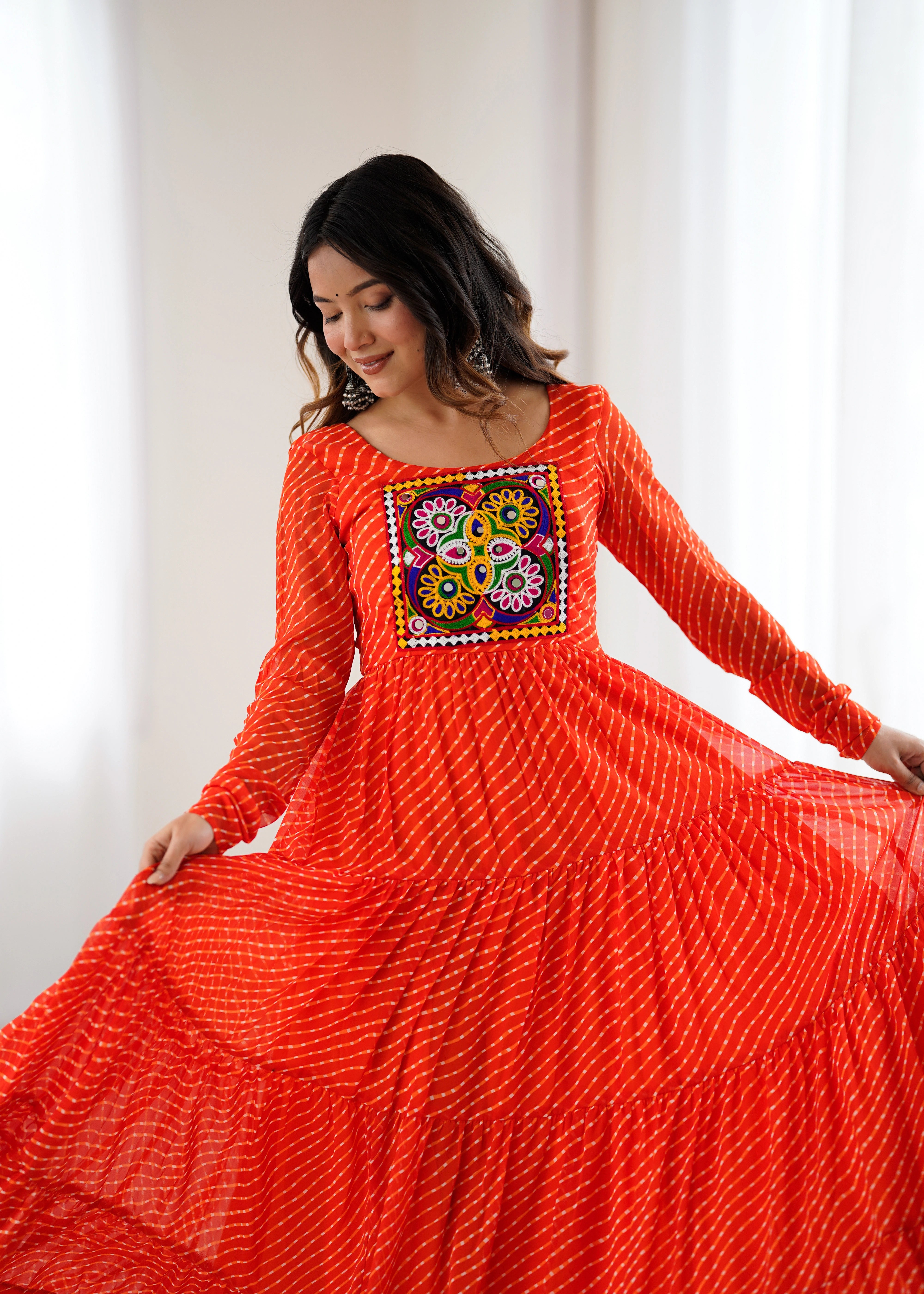 Orange Gamthi with Laheriya Print Fox Georgette Gown