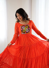 Orange Gamthi with Laheriya Print Fox Georgette Gown