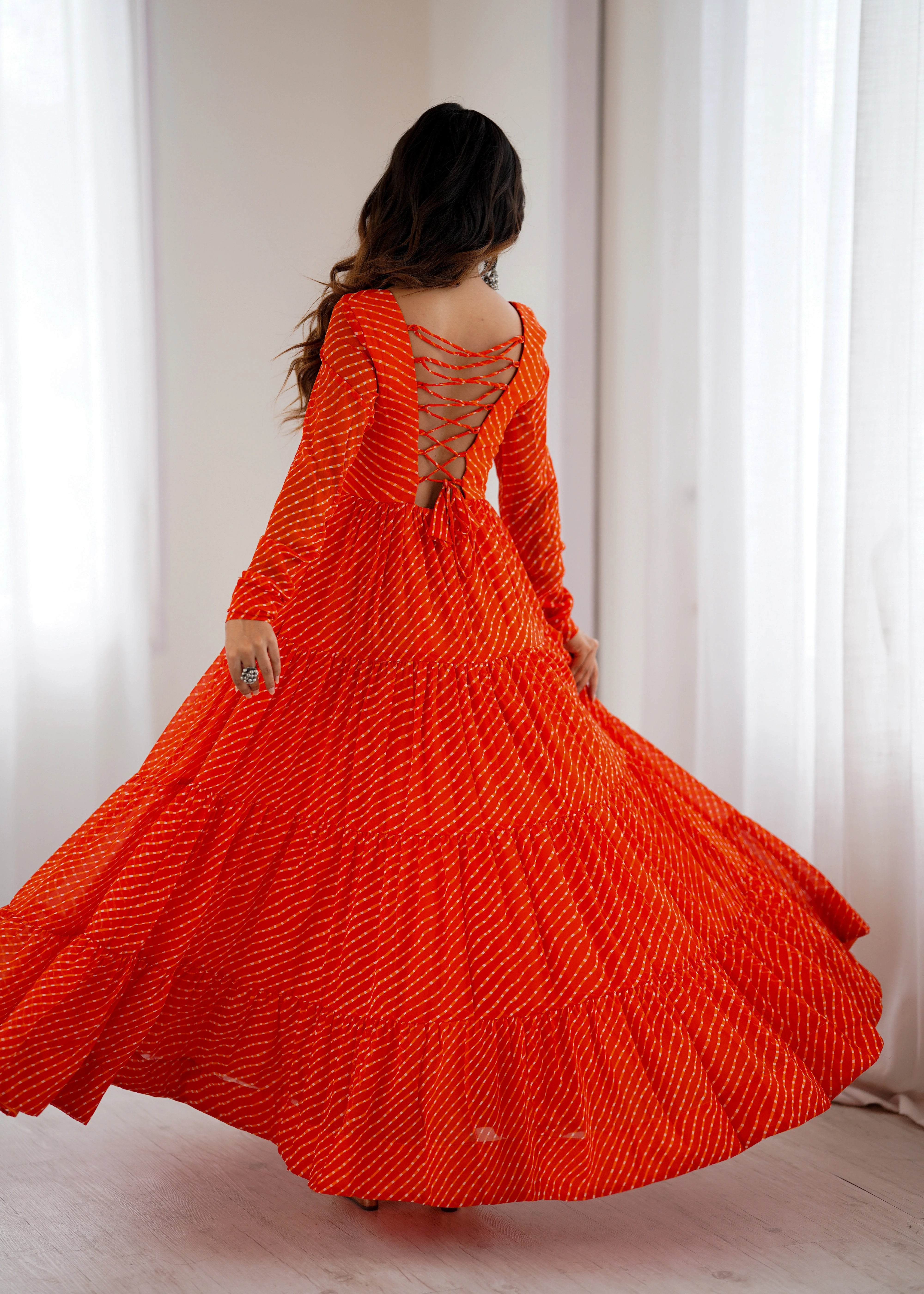 Orange Gamthi with Laheriya Print Fox Georgette Gown