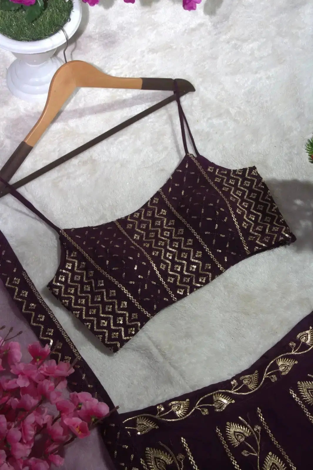 Wine Lehenga choli flat lay on hanger – geometric sequin diamond work, sleeveless crop choli