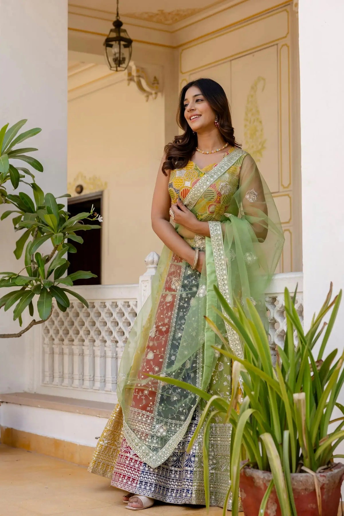 Multicolor Lehenga three quarter view – faux georgette colorblock skirt with sequin border detail