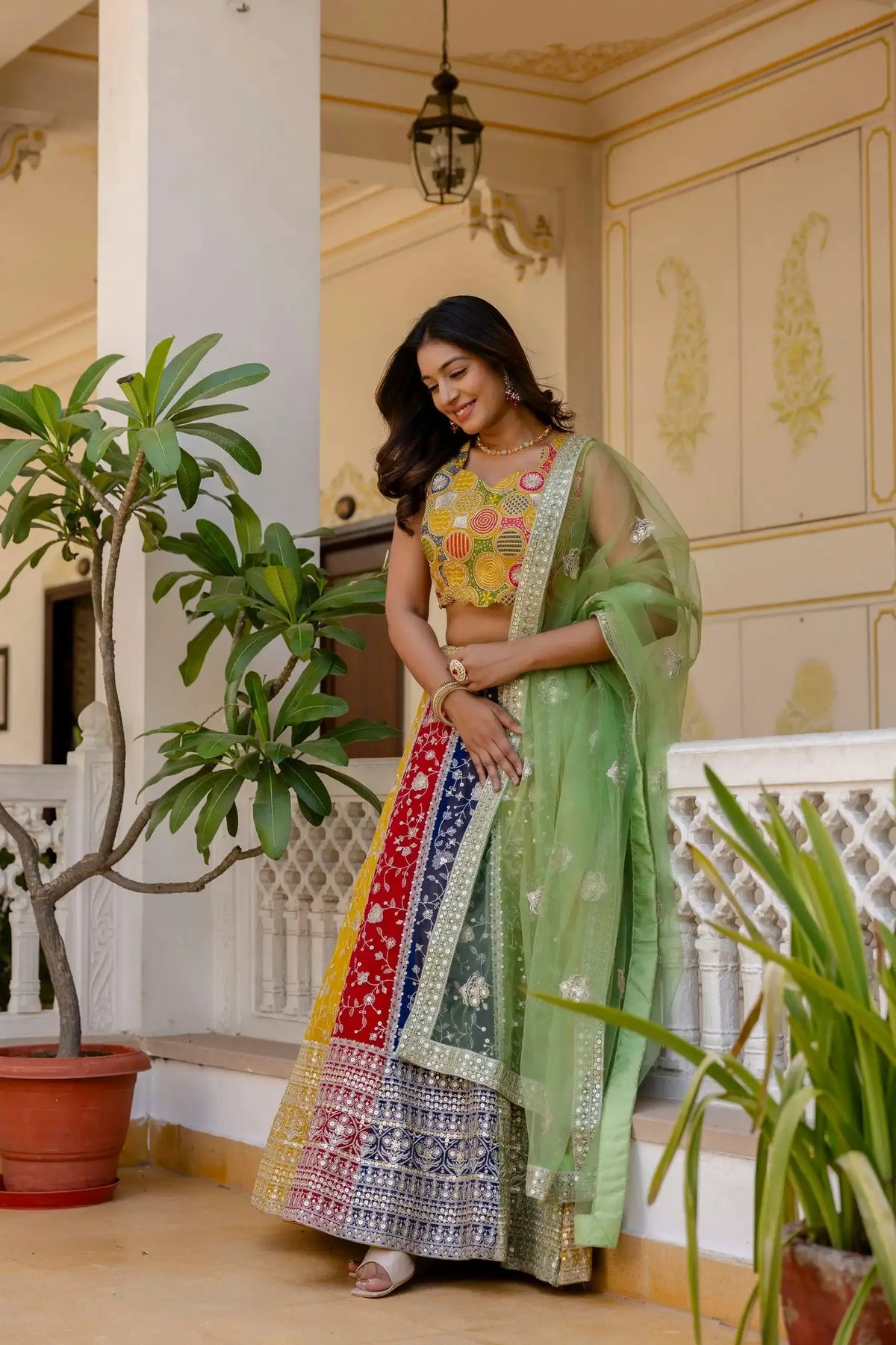 Multicolor Lehenga with green net dupatta draped – sangeet wedding party wear, Kalyanja