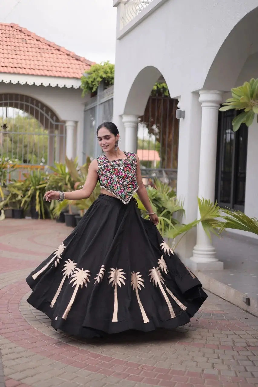 Black Gamthi Embroidered Lehenga – Square Neck sleeveless Gamthi choli contrasting against black circular lehenga skirt