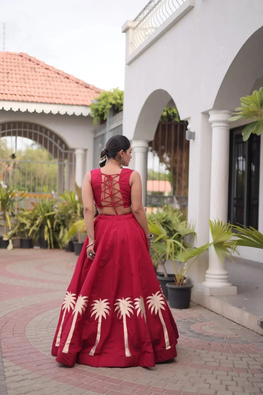 Maroon Gamthi Embroidered Lehenga – Skirt hem detail showing copper palm print border on Roman fabric