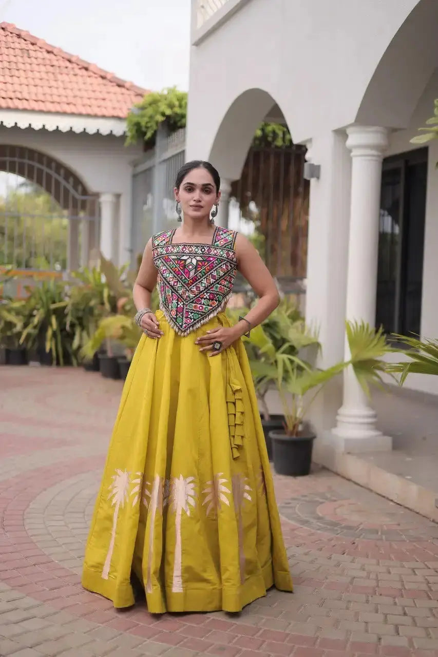 Mustard Yellow Gamthi Embroidered Lehenga – Front drape view showing Roman skirt flair and Gamthi choli with Gota & Lace Work