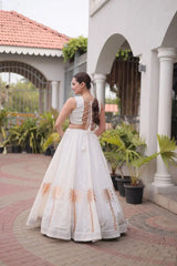 White Gamthi Lehenga back view – open back choli with lace-up dori tie-up, palm print skirt