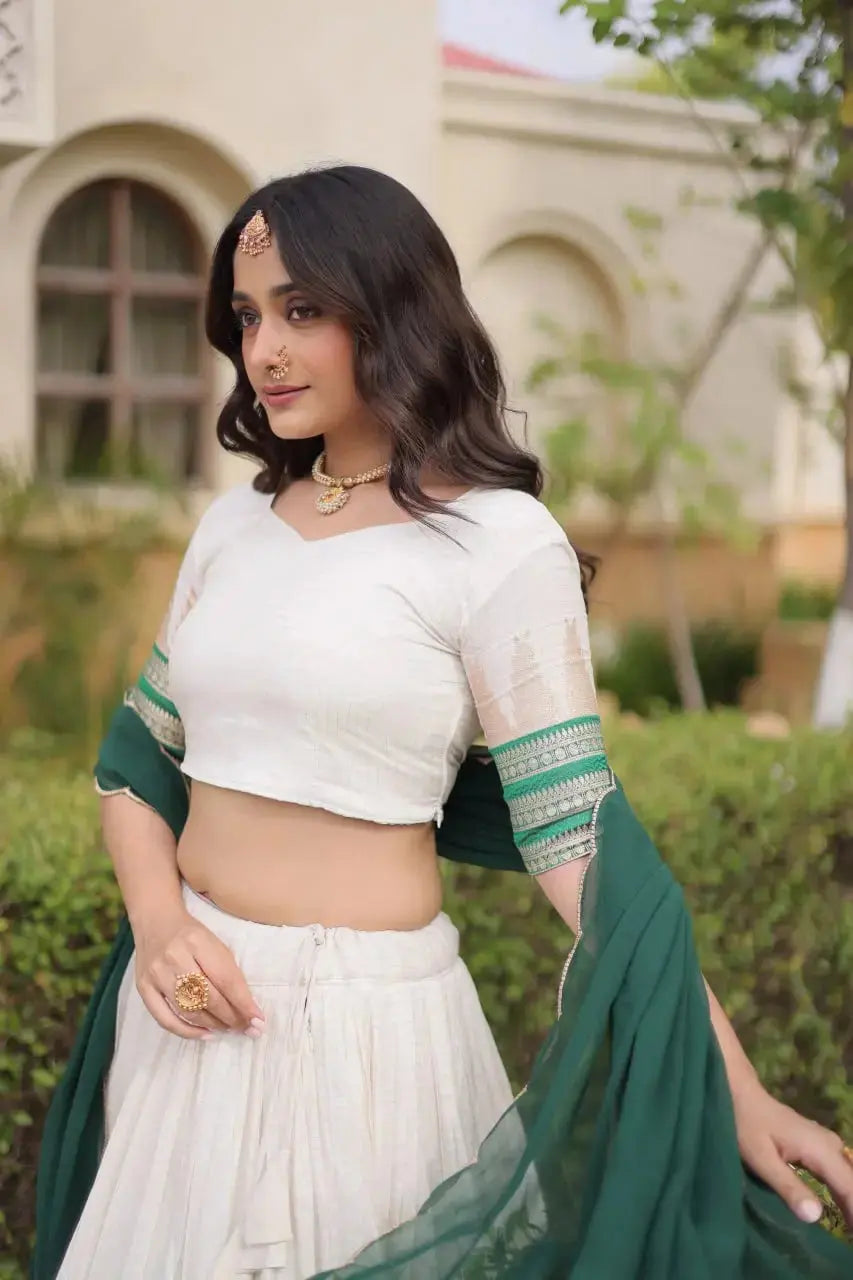 Green Zari Weaving Lehenga choli close-up – square neck, half sleeve with green gold zari cuff band detail