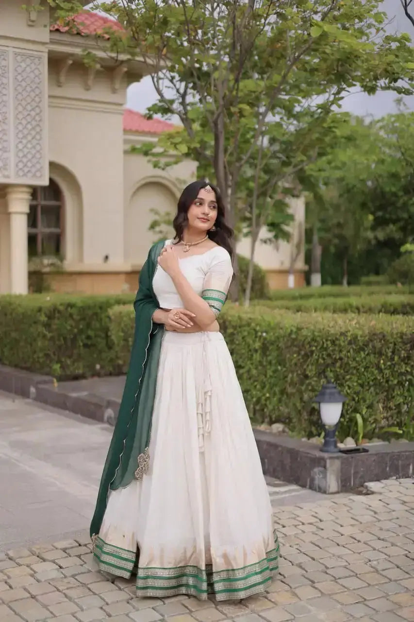 Green Zari Weaving Lehenga with green dupatta – white cream skirt with multi-band zari border, wedding wear