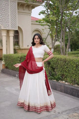Maroon Zari Weaving Lehenga – Skirt border close-up showing geometric temple and floral gold zari motifs on maroon base