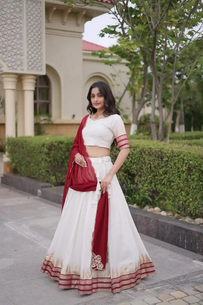 Maroon Zari Weaving Lehenga – Model shot showing deep maroon Viscose Jacquard skirt with woven gold zari temple border
