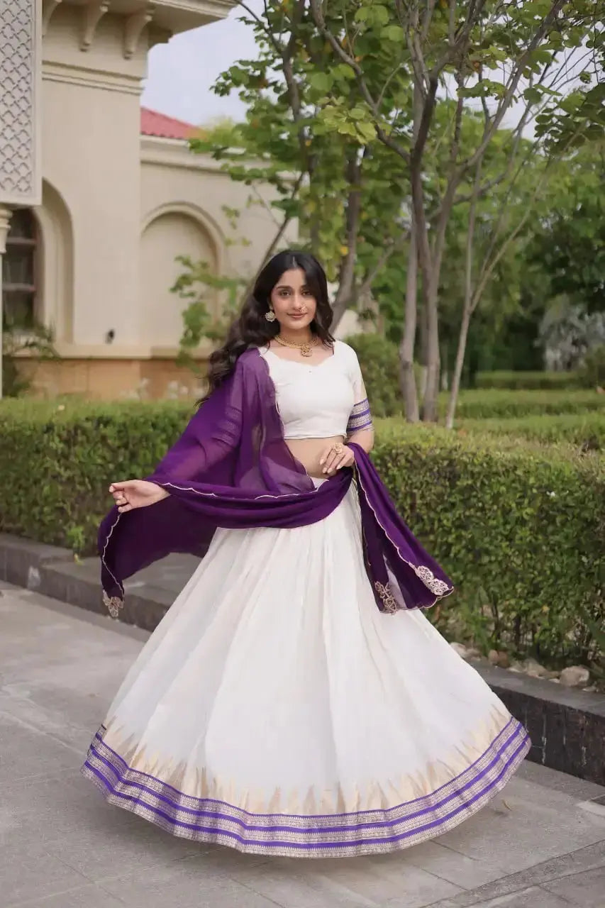 Purple Zari Weaving Lehenga – Skirt border close-up showing geometric temple and floral gold zari motifs