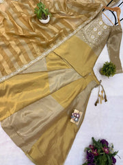 Beige Embroidered Lehenga flat lay – full set with kurta top, lehenga skirt and striped tissue dupatta