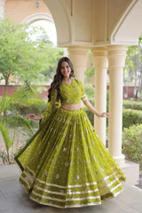 Green Bandhej Print Lehenga – Front drape view showing Faux Georgette skirt with bandhej dots, sequin motifs and gota lace border