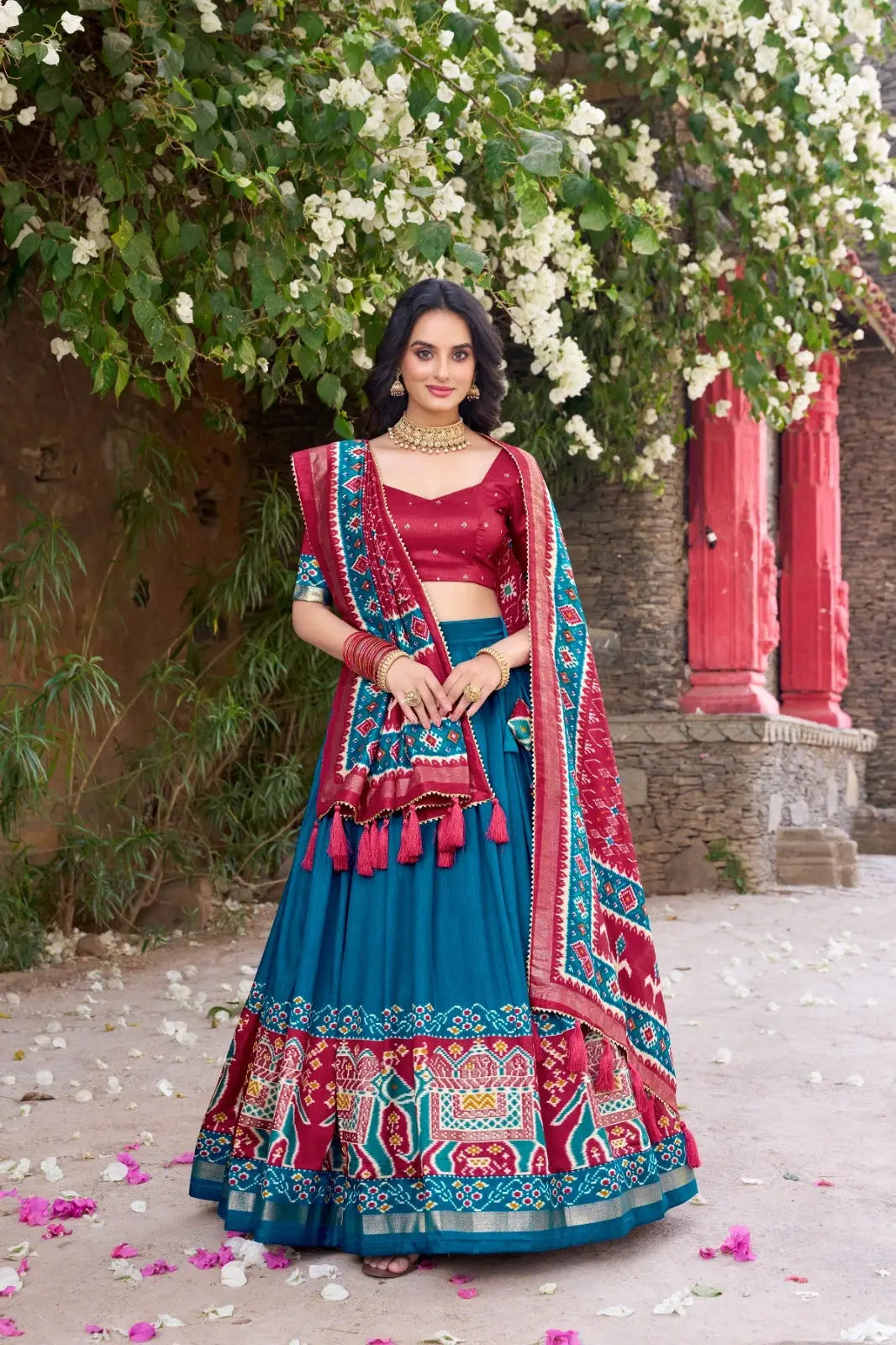 Rama Blue Floral Print Lehenga – Front drape view showing Tussar Silk Blend skirt with patola elephant border and gold foil work