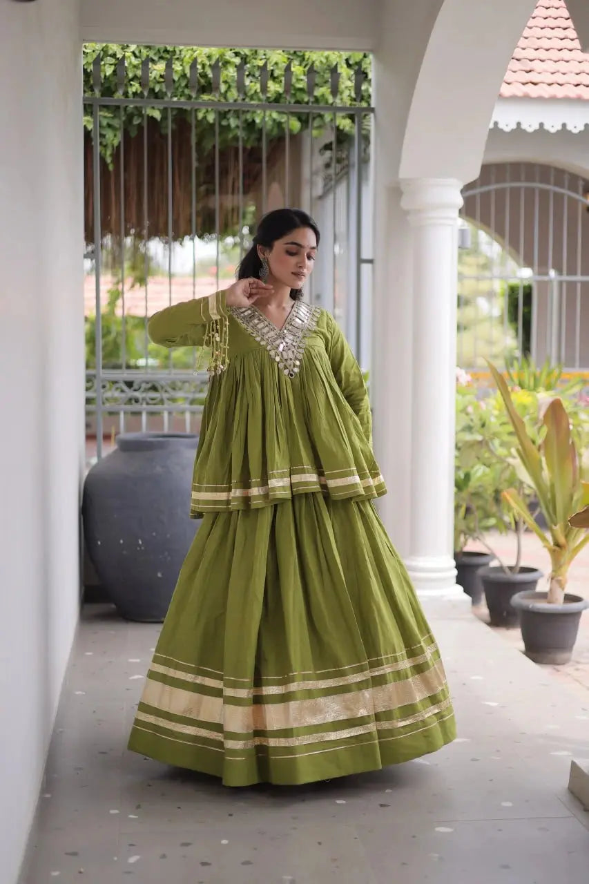 Green Kora Cotton Lehenga side pose – showing 3.5 meter flair, multiple zari and gota patti lace bands on skirt