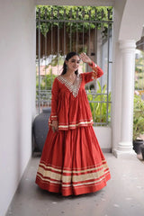 Red Zari Work Lehenga – Front view showing Kora Cotton peplum top with shisha mirror V-neckline and circular skirt with gota patti lace border