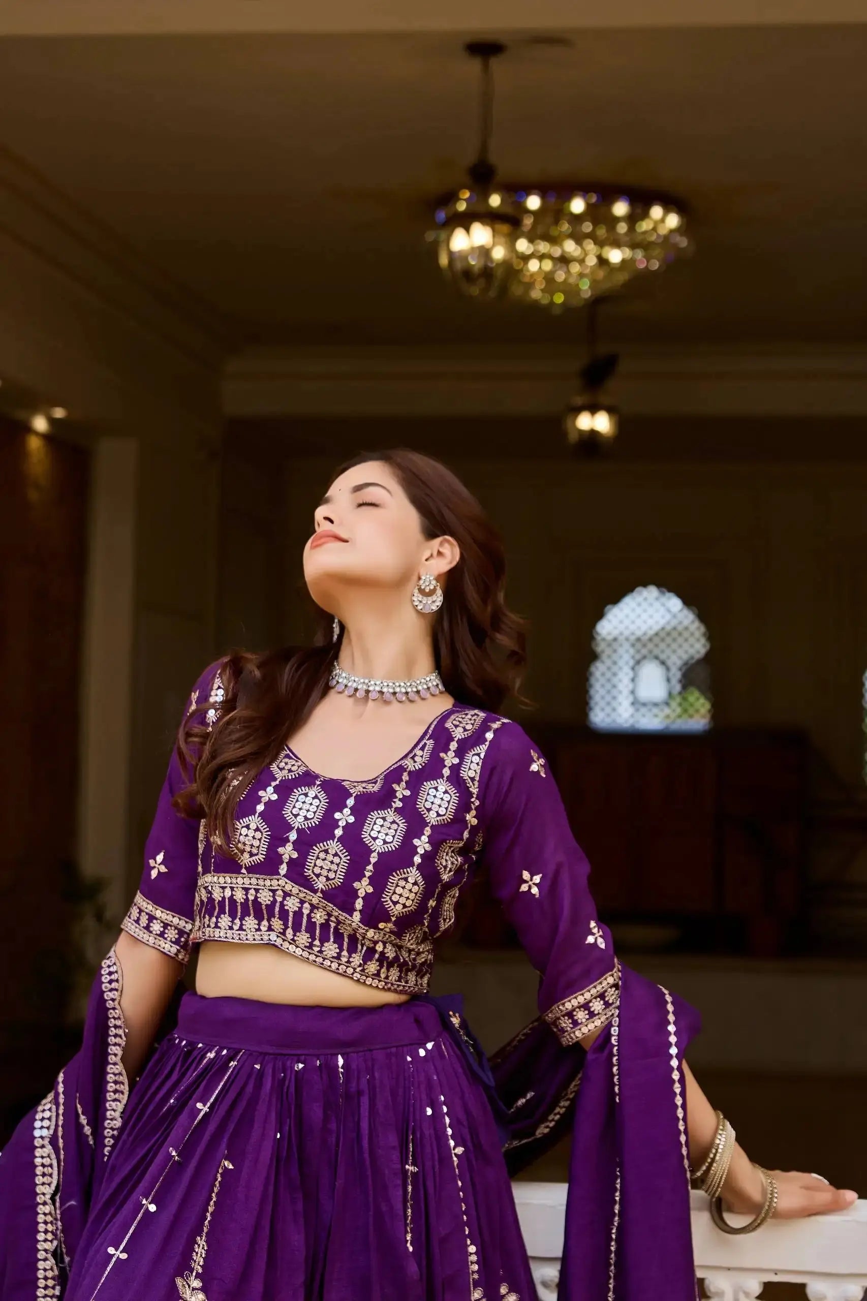 Purple Sequins Embroidered Lehenga – Model wearing purple sequins lehenga with matching dupatta, wedding and reception wear