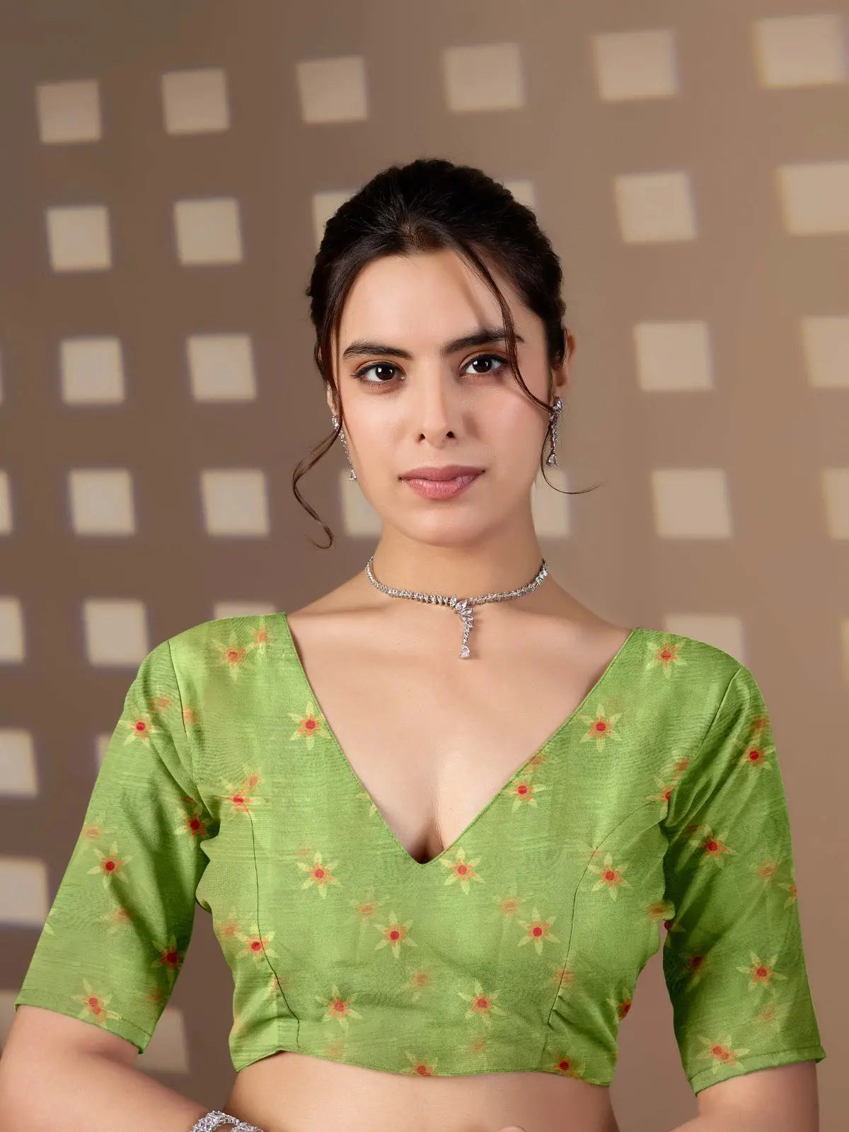 Close-up of running blouse piece — Pista Green Saree with small floral print V-neck blouse detail