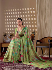 Seated full body view of Pista Green Floral Digital Print Saree in premium monsoon fabric