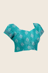 Flat lay of running blouse piece — Aqua Blue Floral Digital Print Saree matching teal leaf print blouse
