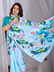 Sky Blue Satin Georgette Saree – pallu held wide showing full crane and lotus print expanse