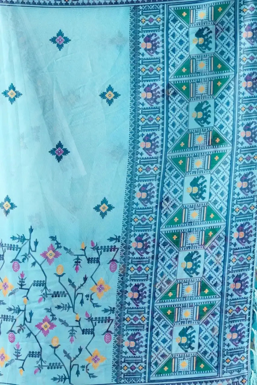Powder Blue Georgette Saree border detail – Patola-style elephant and geometric motif contrast border with teal tassels