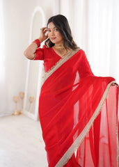 Red Satin Silk Saree – upper body close-up showing gold lace fringe border and red blouse with lace trim