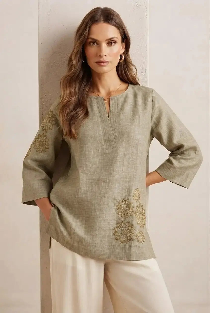 Olive Green Embroidered Linen Short Kurti – Front View Against Wall | Kalyanja