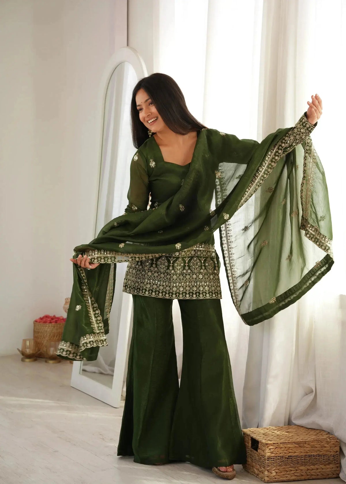 Olive Green Suit with dupatta spread wide — floral booti embroidery and lace border detail visible