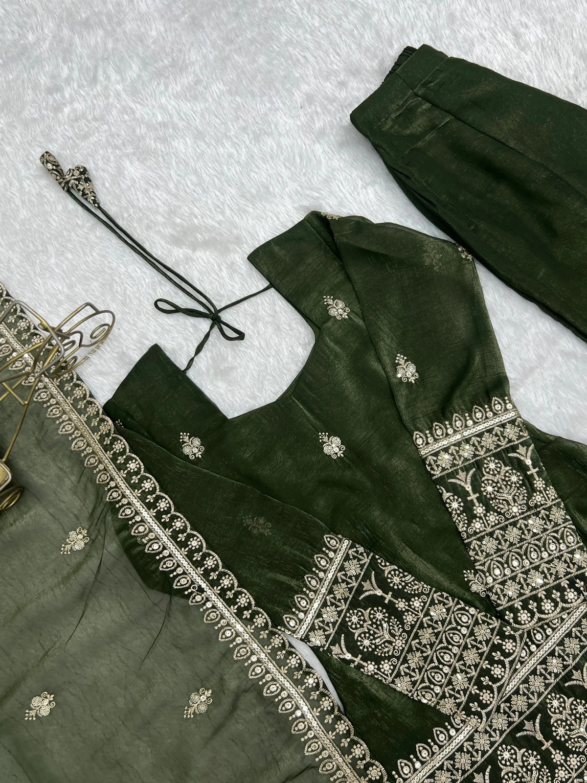 Flat lay side angle of Olive Green Suit showing dupatta, embroidery and pant together