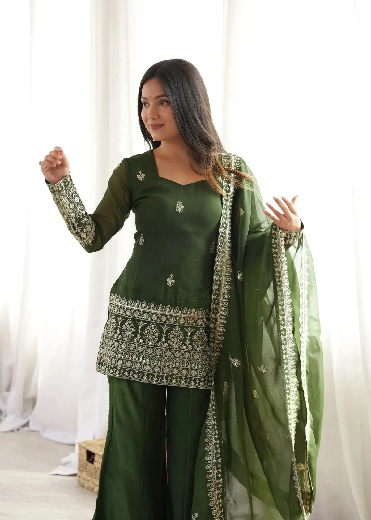 Olive Green Sequins Embroidered Zari Work Suit — front view model with dupatta, looking to the side