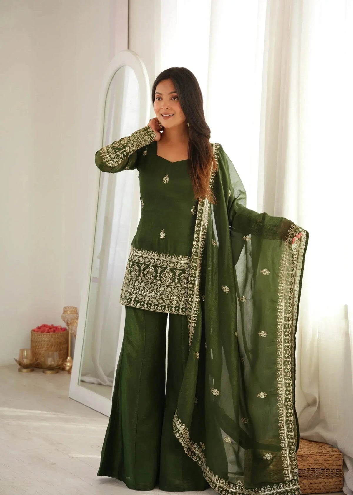 Three-quarter front view of Olive Green Sequins Embroidered Zari Suit with bell bottom pant and dupatta