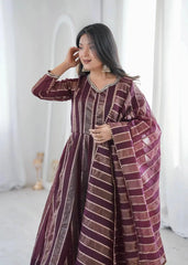 Close-up portrait of mirror work neckline and cuff on wine anarkali suit